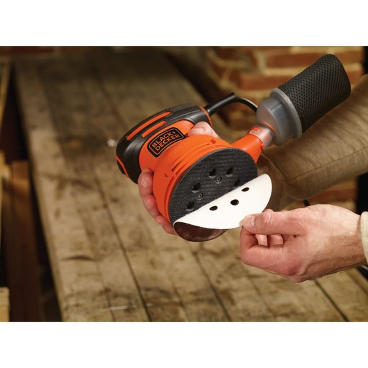 Hook and loop system for easy paper changes feature of 5 inch Random Orbital Sander.